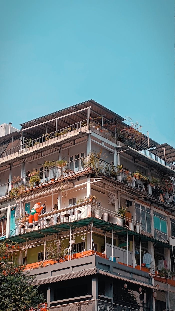 colorful-multi-story-urban-apartment-building-35508488